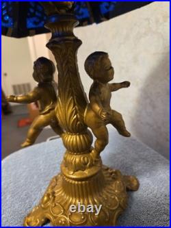 Antique Art Nouveau Brass Table Lamp With 2 Cherubs And 6 Panel Blue Slag Glass
