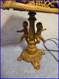 Antique Art Nouveau Brass Table Lamp With 2 Cherubs And 6 Panel Blue Slag Glass Antique Art Nouveau Brass Table Lamp With 2 Cherubs And 6 Panel Blue Slag Glass