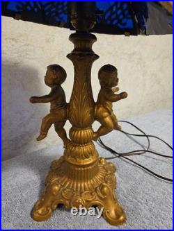 Antique Art Nouveau Brass Table Lamp With 2 Cherubs And 6 Panel Blue Slag Glass