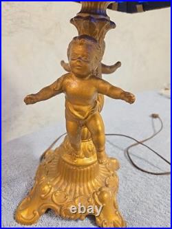 Antique Art Nouveau Brass Table Lamp With 2 Cherubs And 6 Panel Blue Slag Glass