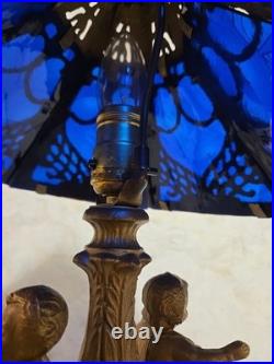 Antique Art Nouveau Brass Table Lamp With 2 Cherubs And 6 Panel Blue Slag Glass