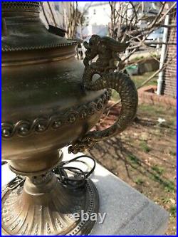 Antique Bradley and Hubbard oil lamp with slag glass shade