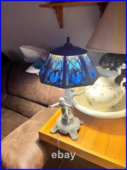 Antique slag glass lamps featuring cherub figures on base. Art Nouveau Style