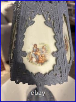 Art Nouveau slag glass boudoir lamp with metal base and painted panels