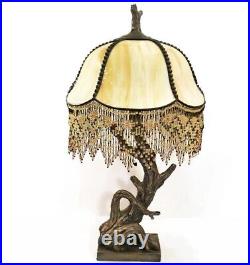 Beaded slag glass lamp. Aesthetic Movement style. Art Nouveau. Tree branch base