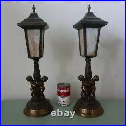 Pair Slag Glass cherub brass and metal Mantle Lamps