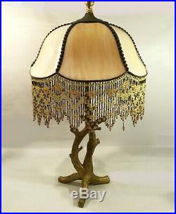Slag glass lamp. Vintage beaded shade with contemporary branch base. Gold hues