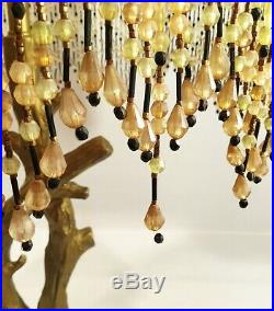 Slag glass lamp. Vintage beaded shade with contemporary branch base. Gold hues