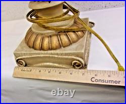Victorian-era slag glass table lamp with a decorative metal base 1910