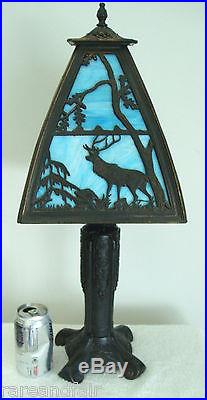 Vintage table lamp with blue slag glass and stag design